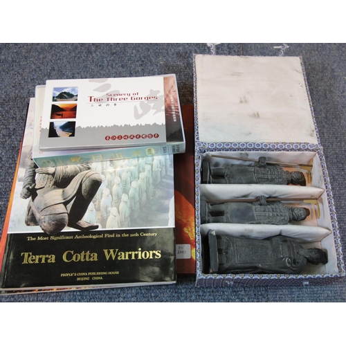 141 - Collection of Chinese related books and a boxed set of 
3 small terracotta warriors. P&P Group 1 (£1... 