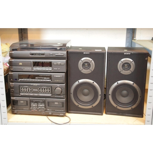 50 - Sony stack HiFi system, two speakers, CDs and cassettes etc. This lot is not available for in-house ... 