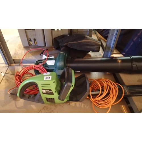 579 - 1800w garden blower vac and a hedge trimmer. This lot is not available for in-house P&P, please cont... 