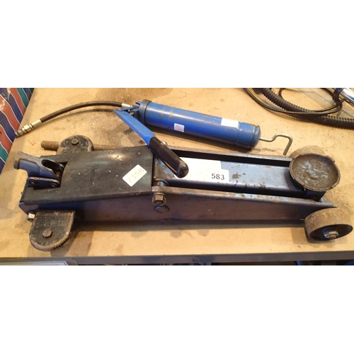 583 - Car trolley jack and a grease gun. This lot is not available for in-house P&P, please contact the of... 