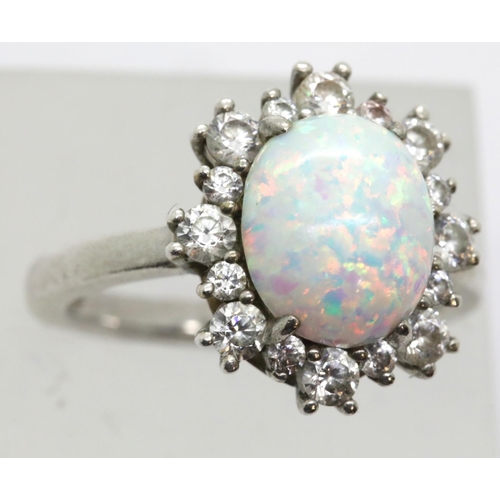 1014 - 925 silver opal and white stone ring, size U, 6.6g. P&P Group 1 (£14+VAT for the first lot and £1+VA... 