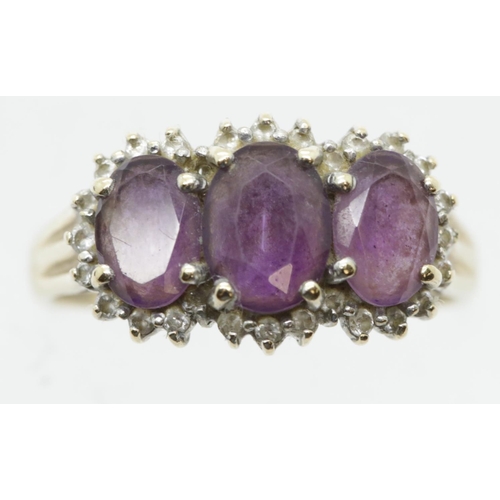 1022 - 9 ct gold amethyst & diamond ring, size R/S, 3.1g. P&P Group 1 (£14+VAT for the first lot and £1+VAT... 