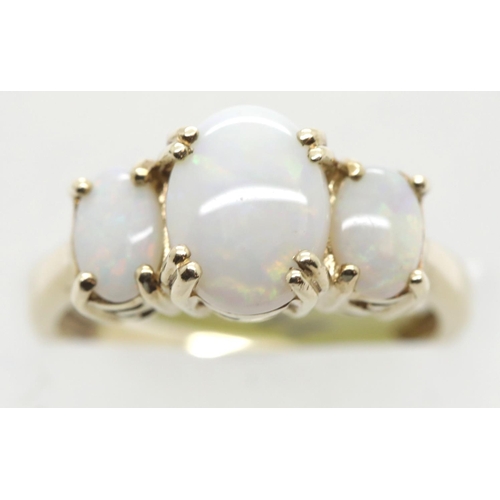 1028 - Ladies 9ct gold three stone claw set opal ring, size L, 3.6g. P&P Group 1 (£14+VAT for the first lot... 