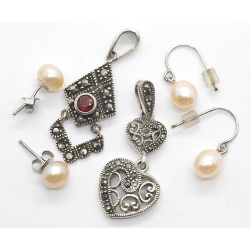 1059 - Two pairs of ladies stud earrings and two vintage marcasite pendants. P&P Group 1 (£14+VAT for the f... 