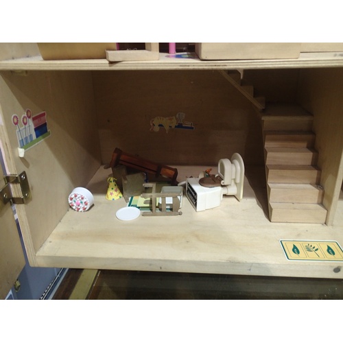 2330 - Large childs painted wood dolls house with large quantity of accessories and furniture. P&P Group 2 ... 