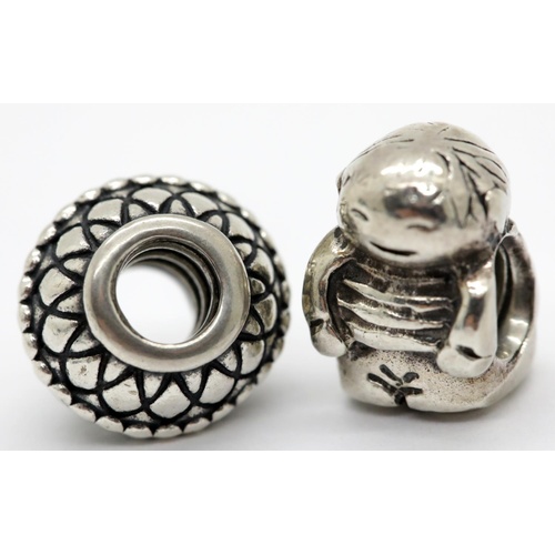 1197 - Two Pandora charms, stamped A.L.E. P&P Group 1 (£14+VAT for the first lot and £1+VAT for subsequent ... 