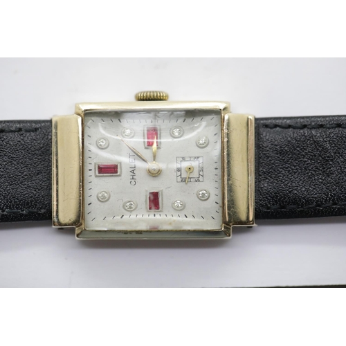 1003 - 14ct gold Chalet wristwatch set with semi precious stones on a leather strap
 P&P Group 1 (£14+VAT f... 