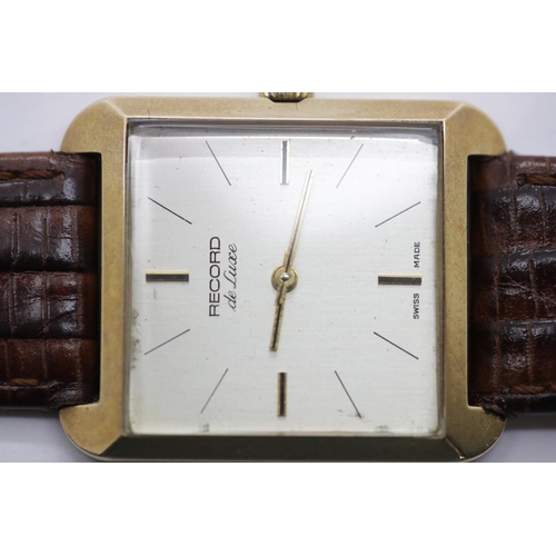 1006 - Gents 9ct gold Record Deluxe 17 jewel Swiss movement wristwatch on leather strap, case W: 27 mm. P&P... 