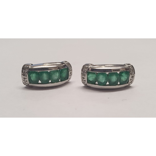 1199 - Pair of contemporary 9ct white gold, emerald and diamond earrings. P&P Group 1 (£14+VAT for the firs... 