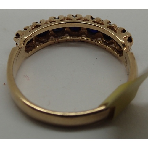 1070 - Vintage 9ct yellow gold seven stone sapphire ring, size M, 2.6g. P&P Group 1 (£14+VAT for the first ... 