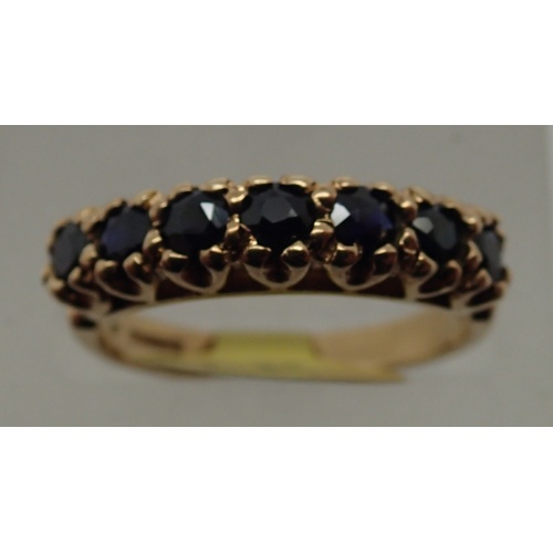 1070 - Vintage 9ct yellow gold seven stone sapphire ring, size M, 2.6g. P&P Group 1 (£14+VAT for the first ... 