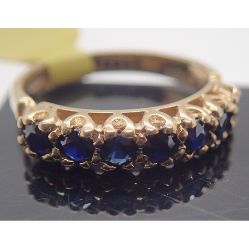 1070 - Vintage 9ct yellow gold seven stone sapphire ring, size M, 2.6g. P&P Group 1 (£14+VAT for the first ... 