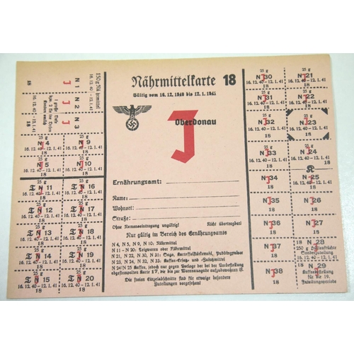 1569 - German WWII style ration card, showing scarce J overstamp to only only provide starvation rations, 2... 