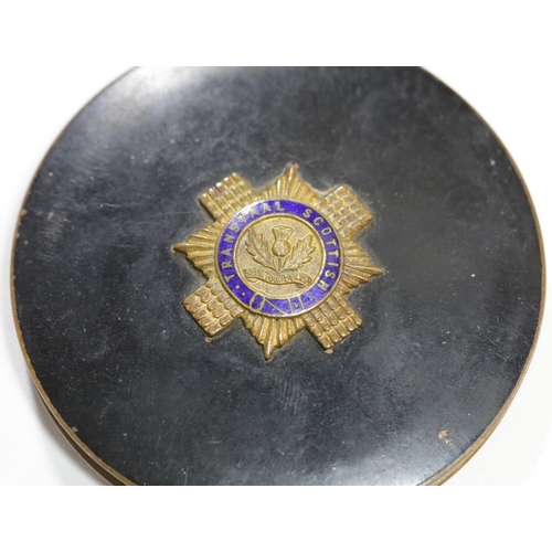 1596 - Early 20th century enamelled metal circular compact, surmounted with a Transvaal Scottish Regiment b... 