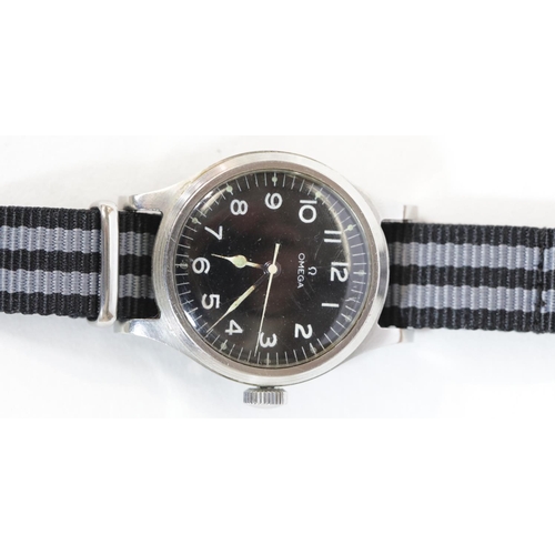 1576 - A gentleman's stainless steel British Military Omega RAF pilots wristwatch dated 1956, with black di... 