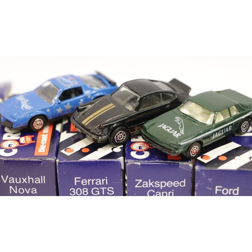 1002 - Thirteen Corgi Juniors scale vehicles including Zakspeed Capri, Jaguar Track car and a Forder Wrecke... 