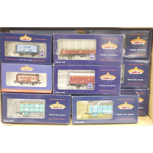 1110 - Twelve assorted Bachmann wagons including VBA vans and OCA wagon, some weathered. P&P Group 2 (£18+V... 