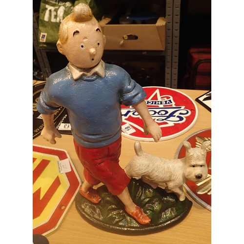 17 - Cast iron Tin Tin and dog doorstop, H: 30 cm. P&P Group 2 (£18+VAT for the first lot and £2+VAT for ... 