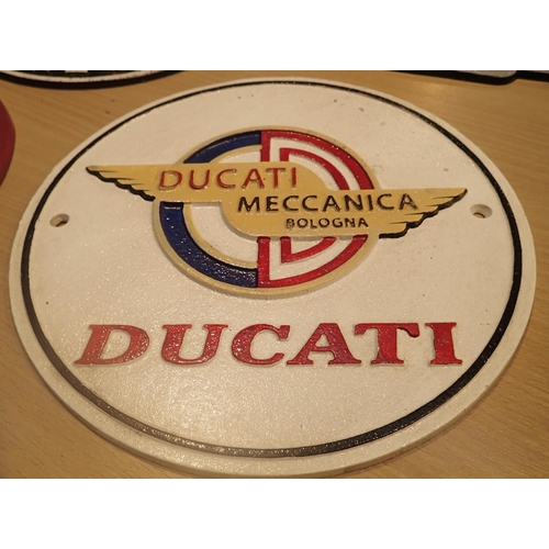 31 - Cast iron Ducati sign, D: 20 cm. P&P Group 2 (£18+VAT for the first lot and £2+VAT for subsequent lo... 