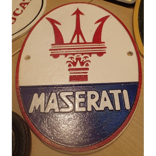 29 - Cast iron Maserati wall sign, L: 29 cm. P&P Group 2 (£18+VAT for the first lot and £2+VAT for subseq... 