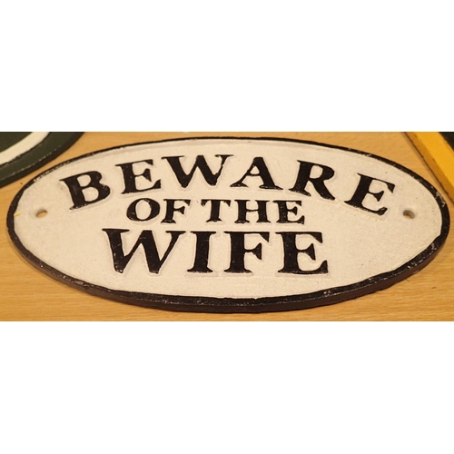 10 - Cast iron Beware of the Wife sign, L: 17 cm. P&P Group 2 (£18+VAT for the first lot and £2+VAT for s... 