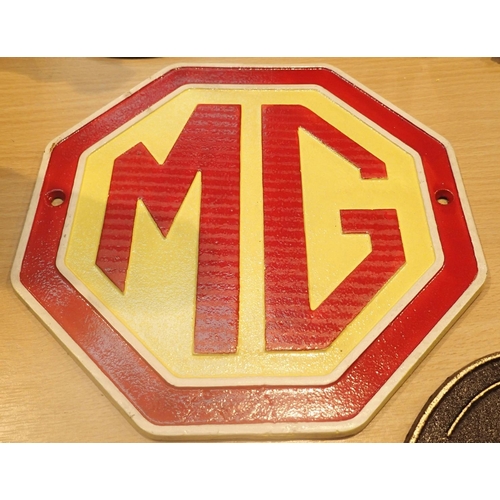 11 - Cast iron MG Motors wall sign, H: 24 cm. P&P Group 2 (£18+VAT for the first lot and £2+VAT for subse... 