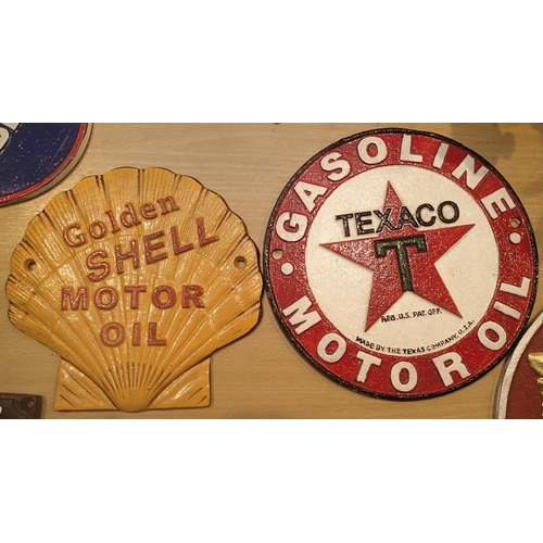 27 - Two cast iron signs Texaco and Shell Motor Oil. P&P Group 3 (£25+VAT for the first lot and £5+VAT fo... 