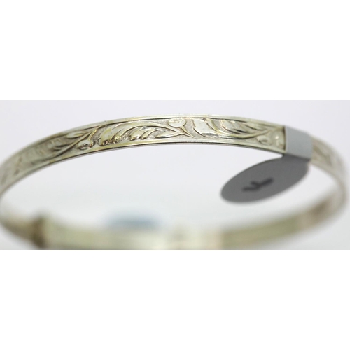 1209 - Heavy solid sterling silver engraved adjustable bangle, D: 4.6 cm, 6.5g. P&P Group 1 (£14+VAT for th... 