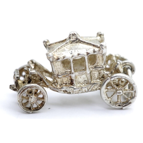 1256 - Sterling silver Cinderella coach pendant, L: 2.3 cm, 3.6g. P&P Group 1 (£14+VAT for the first lot an... 