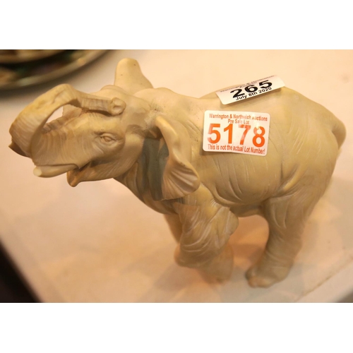 265 - Cast ceramic elephant figurine, L: 20 cm. This lot is not available for in-house P&P.