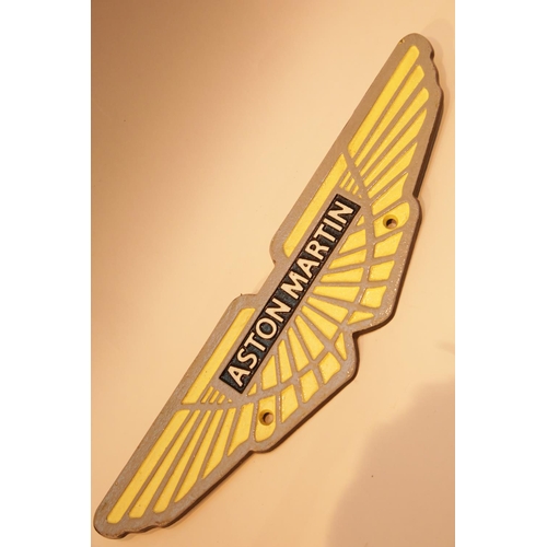 35 - Cast iron Aston Martin sign, L: 34 cm. P&P Group 2 (£18+VAT for the first lot and £2+VAT for subsequ... 