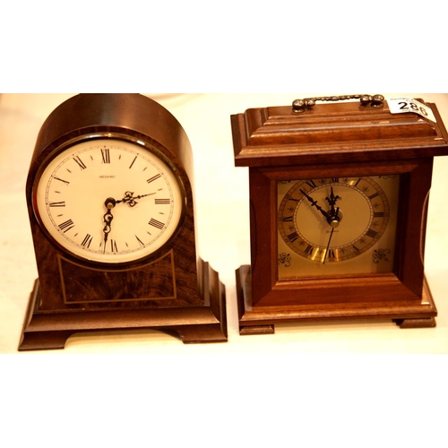 286 - Two quartz movement wood cased mantel clocks. This lot is not available for in-house P&P.