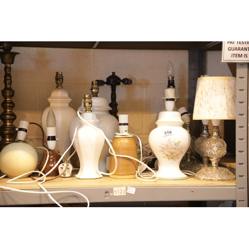 319 - Shelf of mixed table lamps. This lot is not available for in-house P&P.
Condition Report: All electr... 