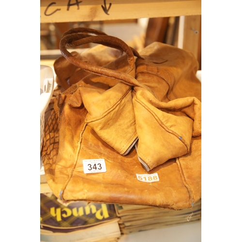 343 - Large tan leather weekend holdall. This lot is not available for in-house P&P.