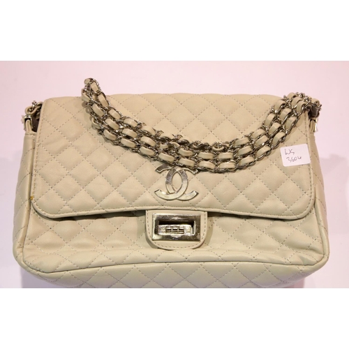 1377 - Two handbags marked Chanel, one boxed. Red bag has wear damage to corners. P&P Group 2 (£18+VAT for ... 