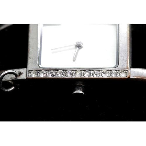 1310 - Boxed Karen Millan wristwatch  P&P Group 1 (£14+VAT for the first lot and £1+VAT for subsequent lots... 