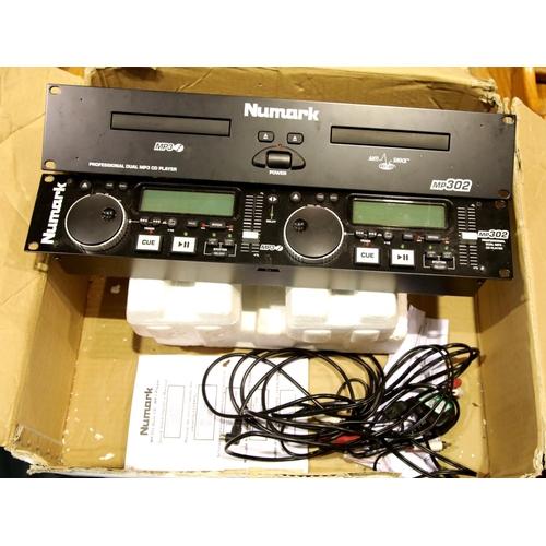 1324 - Boxed Numark MP302 professional dual MP3 CD player. This lot is not available for in-house P&P.