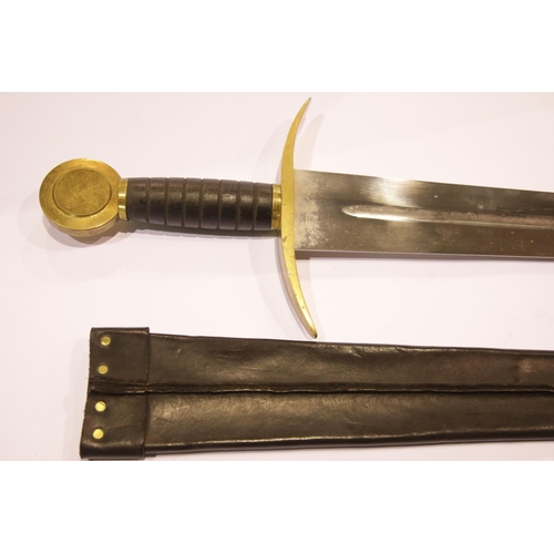 1375 - Re-enactment broadsword with brass hilt, guard and leather scabbard.  P&P Group 2 (£18+VAT for the f... 