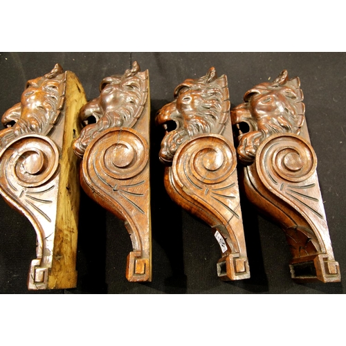 1494 - Four good carved lion corbels H: 28 cm. P&P Group 2 (£18+VAT for the first lot and £2+VAT for subseq... 