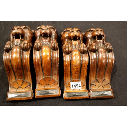 1494 - Four good carved lion corbels H: 28 cm. P&P Group 2 (£18+VAT for the first lot and £2+VAT for subseq... 