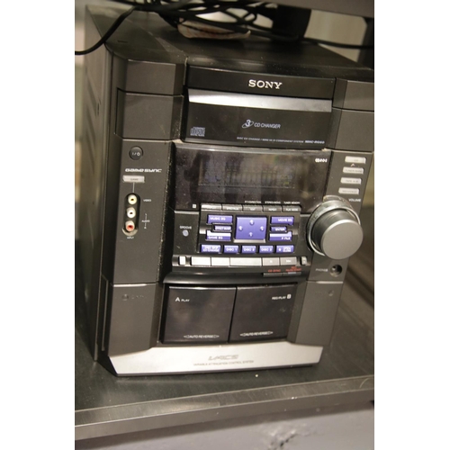 1542 - Sony Stereo system with four speakers and a Bush turntable. This lot is not available for in-house P... 