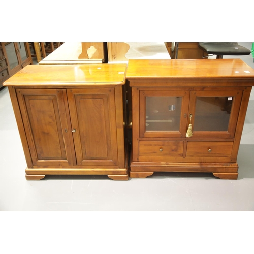 1614 - Modern two door panelled bookcase and a similar two door glazed media cabinet.  This lot is not avai... 