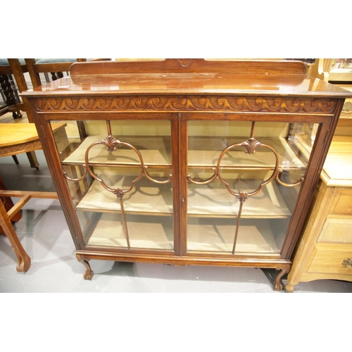 1618 - Late 19th century mahogany two door glazed display cabinet raised on claw and ball supports, 123 x 4... 