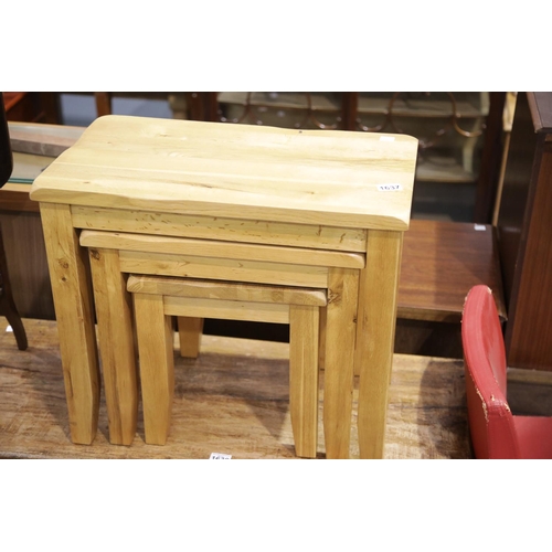 1637 - Modern beech nest of three graduated occasional tables, largest 60 x 34 x 53 cm.  This lot is not av... 