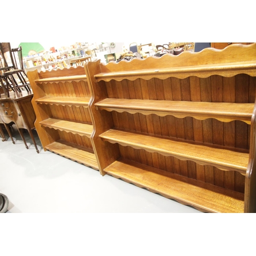 1644 - Pair of large mahogany waterfall bookcases 150 x 129 cm H. This lot is not available for in-house P&... 