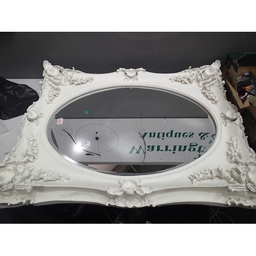 1735A - Large cast decorative oval wall mirror, frame, 103 x 83 cm, mirror: 78 x 58 cm. This lot is not avai... 