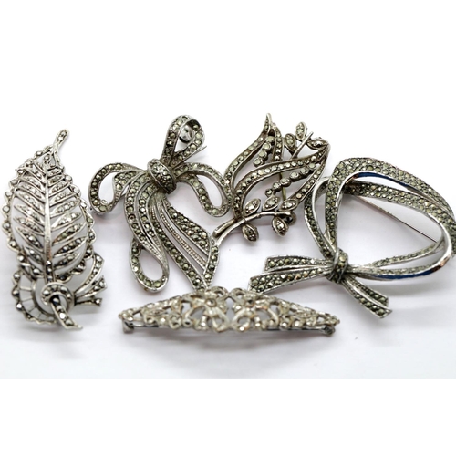 1653 - Four white metal, possibly silver, marcasite set brooches. P&P Group 1 (£14+VAT for the first lot an... 