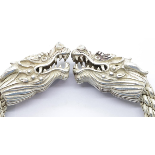 1621 - White metal Tibetan silver large dragon bangle, D: 9 cm. P&P Group 1 (£14+VAT for the first lot and ... 