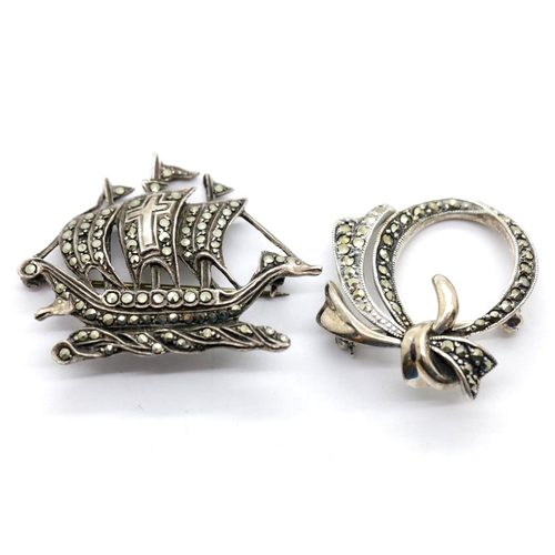 1631 - 925 silver marcasite sailing ship brooch and another similar brooch, ship L: 4 cm, 15g. P&P Group 1 ... 