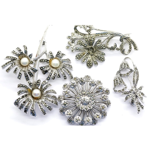 1639 - Four white metal, possibly silver, marcasite set brooches, 61g. P&P Group 1 (£14+VAT for the first l... 
